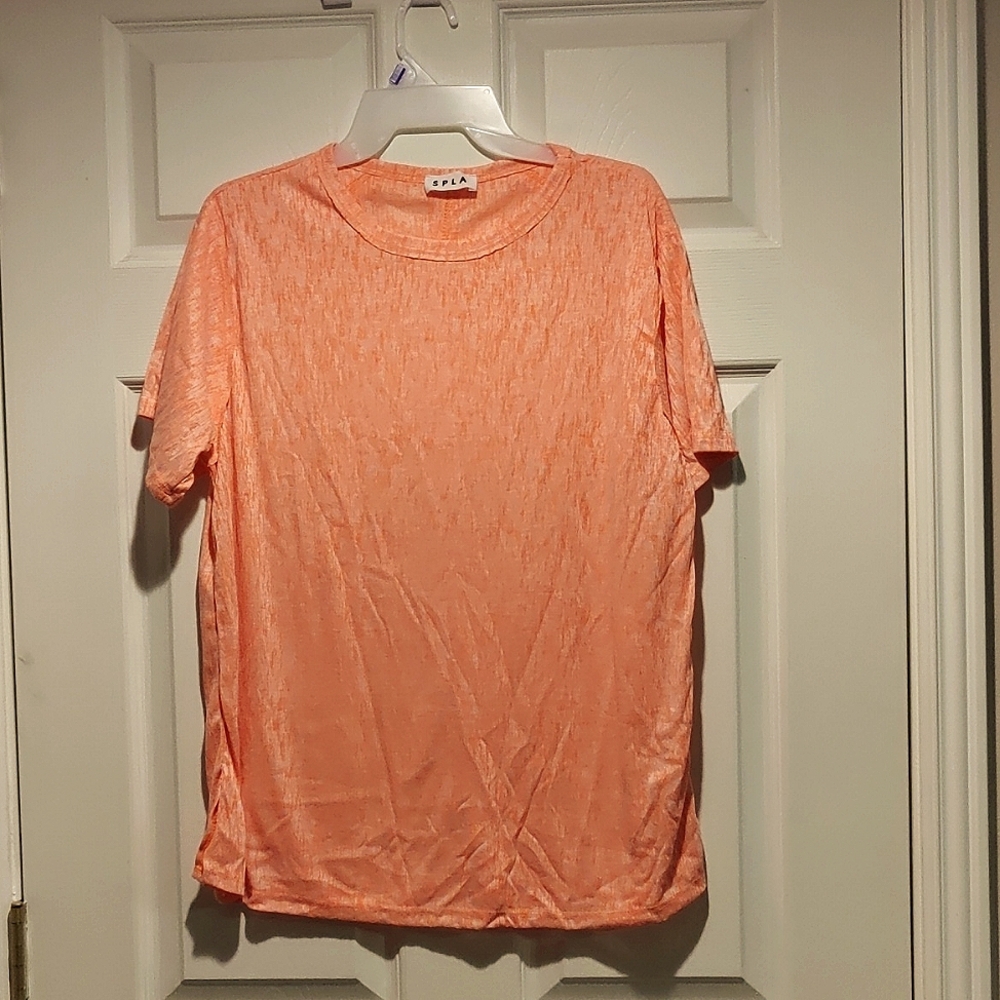 Neon coral top with slid slits.